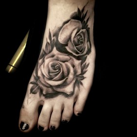 rosed tattoo.jpg